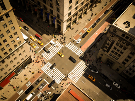 An aerial view of an urban intersection.