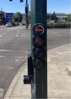 Near-side Bike Countdown Timer pictured at a signalized intersection