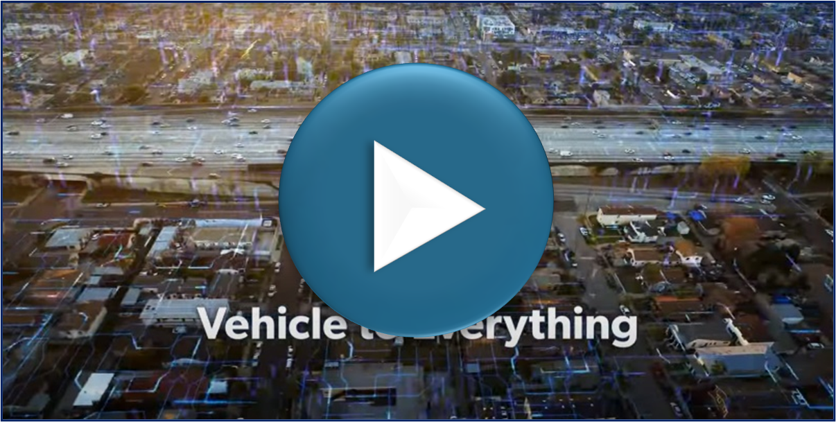 Thumbnail of V2X YouTube video. Thumbnail image is showing an aerial view of a city with cars driving on the highway.