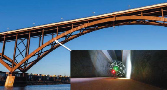 Image of bridge and a zoomed in image of a drone inspecting the bridge. 