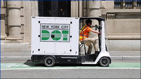 A man using micromobility to deliver packages.
