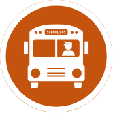 An illustration of a school bus with the bus driver sitting in the front window.